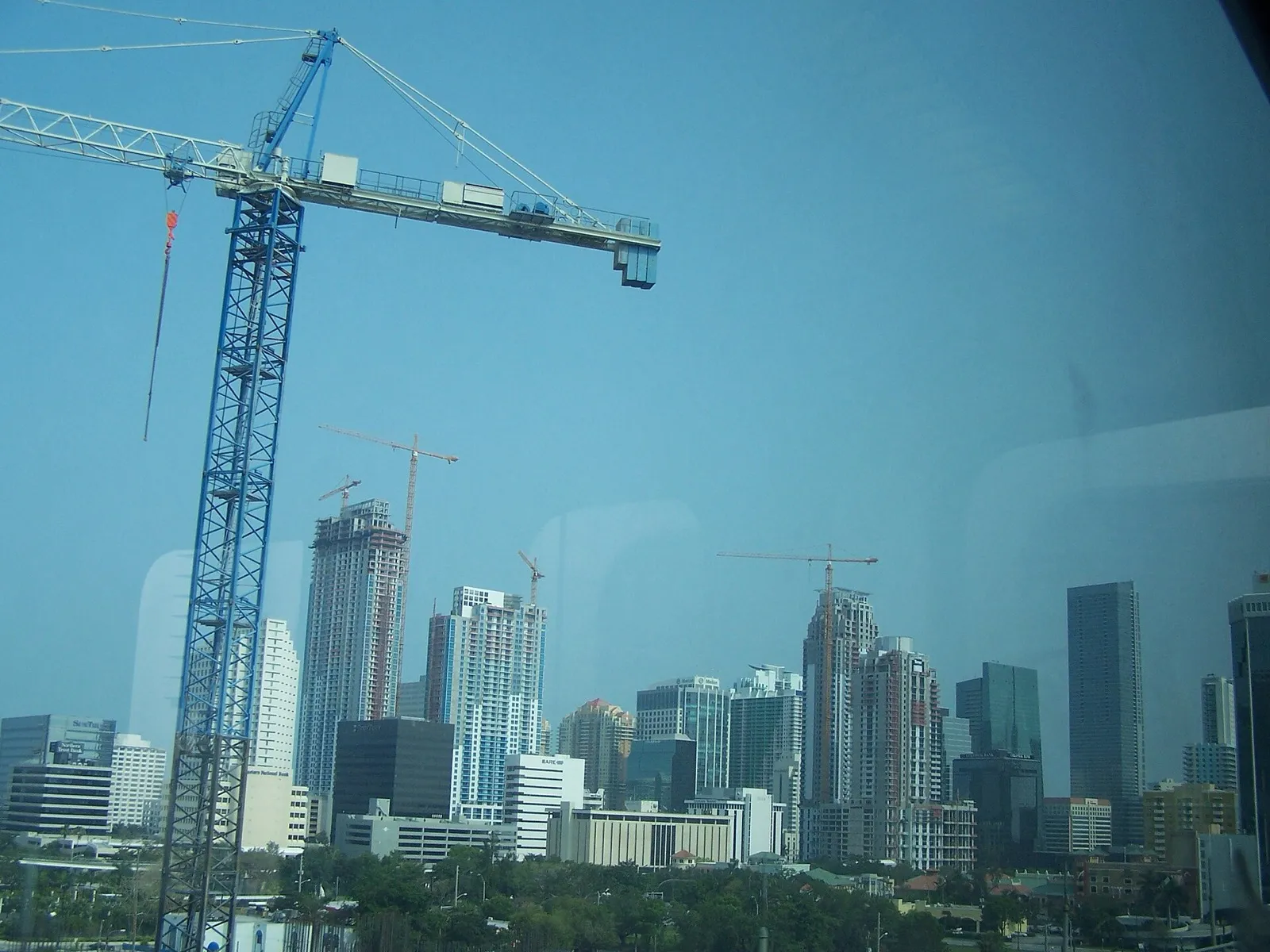 New condos in Miami, Florida — pre-construction condo towers rising over the skyline